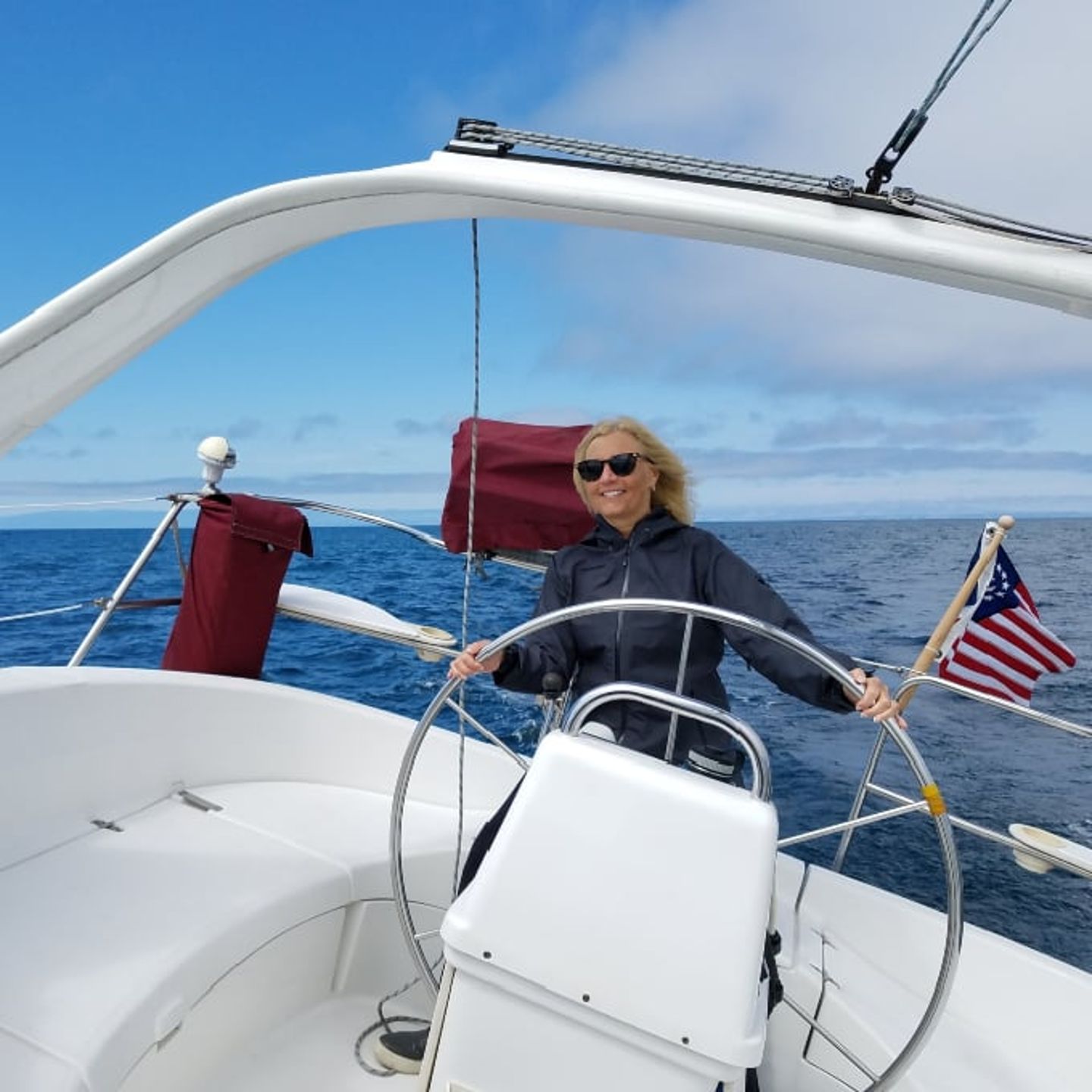 Woman driving boat