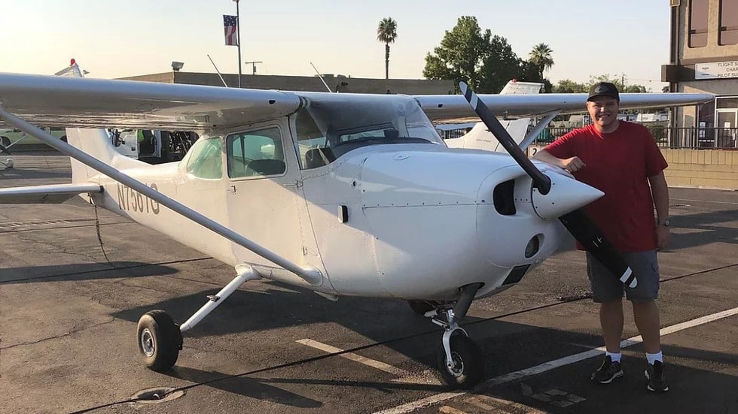 Person next to plane