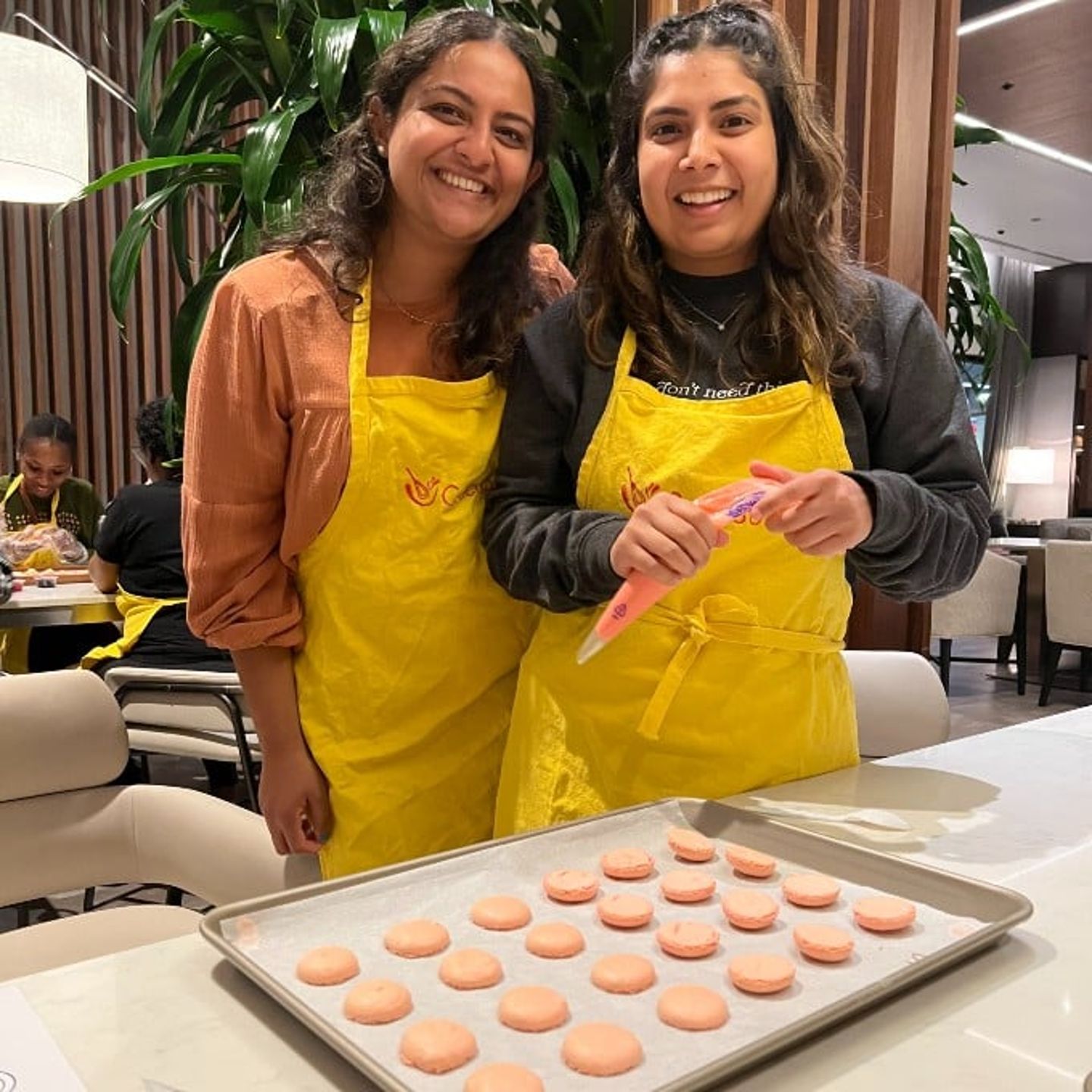 Group with tray of macarons
