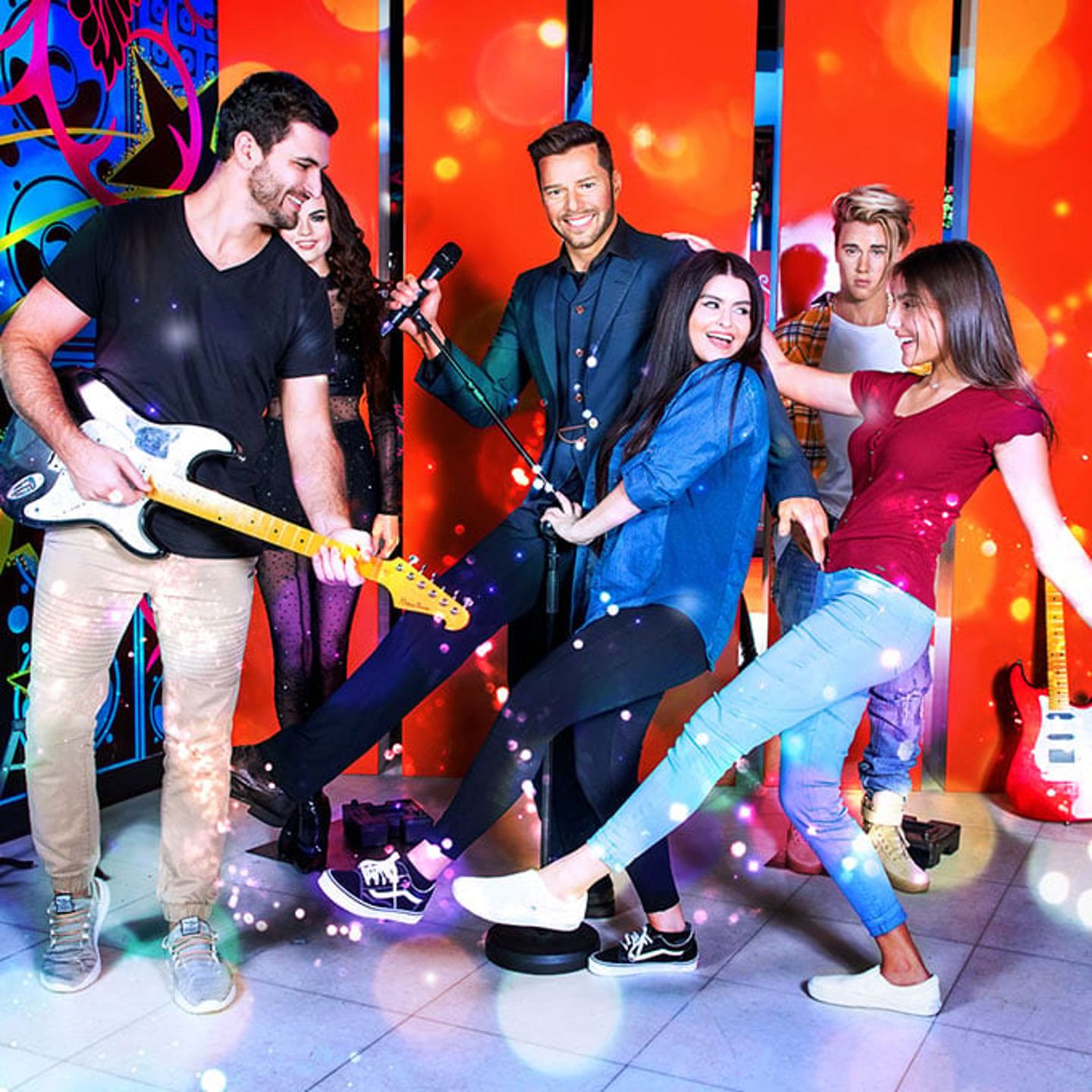 Group posing with band