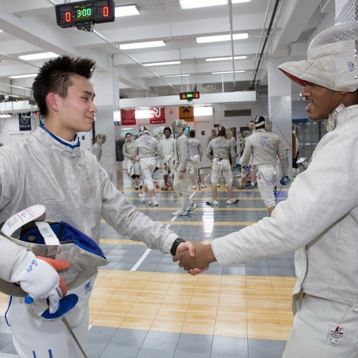 Two People Shaking Hands After Match