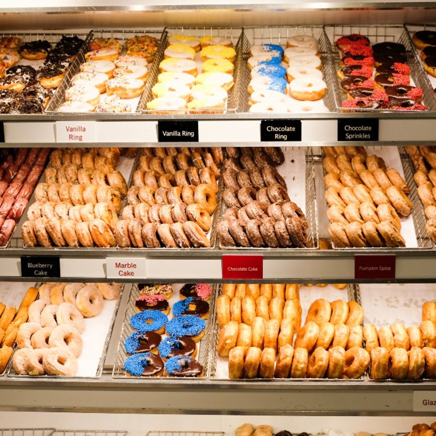 Lots of Donuts in Display Case