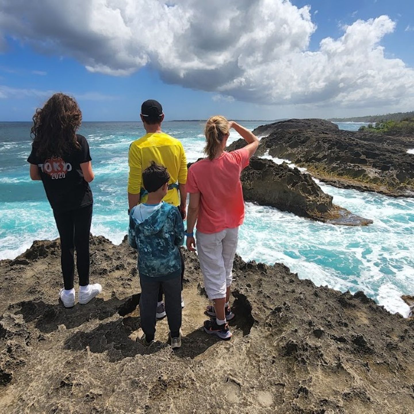 Group on Rock Looking at Water
