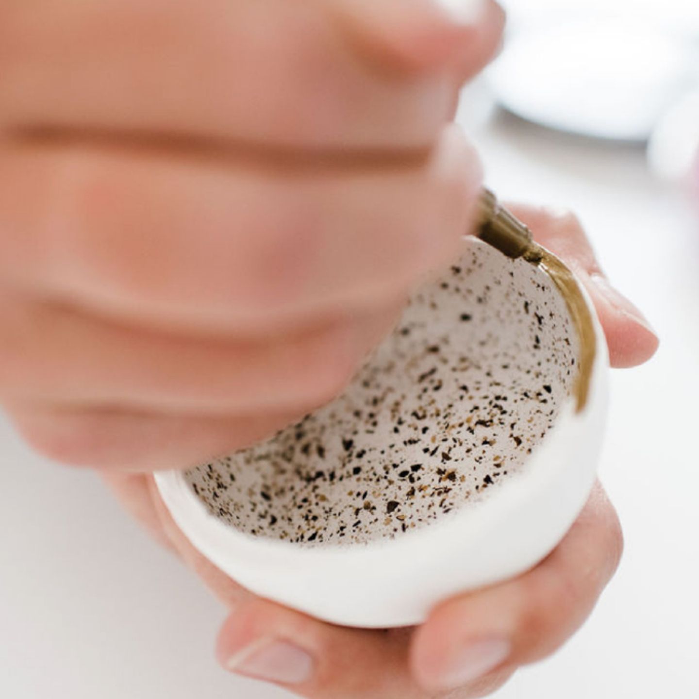 Person working with clay
