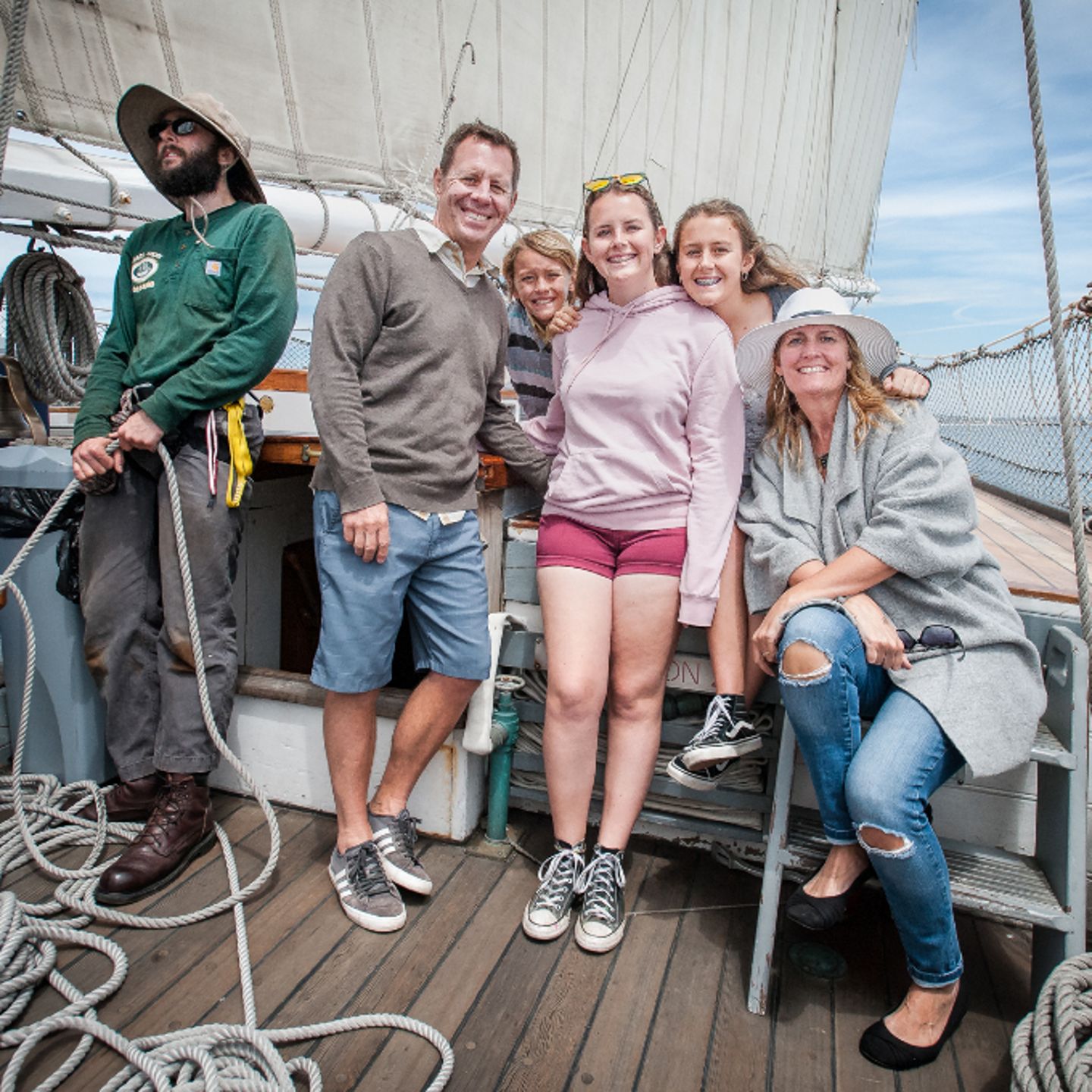Family posing on ship