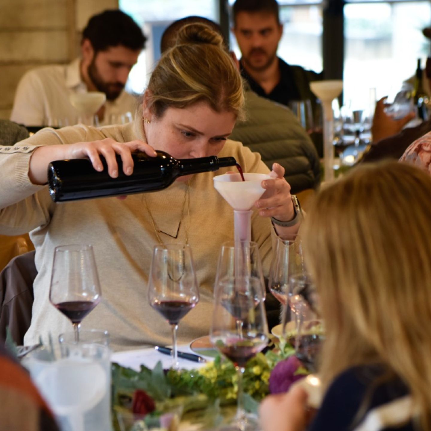 Woman pouring wine