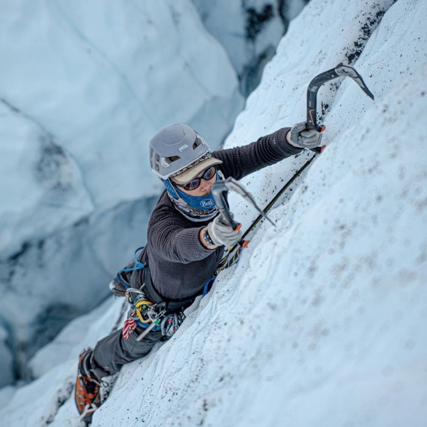 Woman Climbing on Glacier