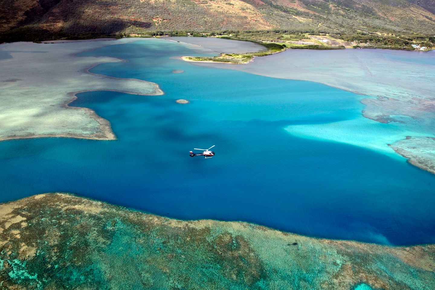 Helicopter over water