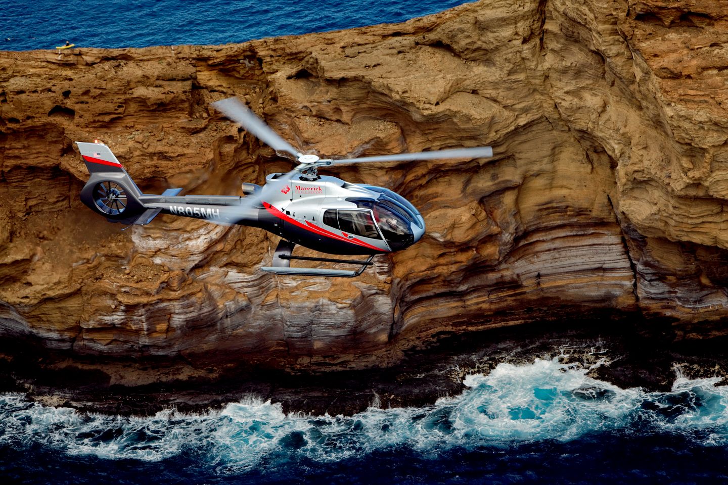 Helicopter over rock