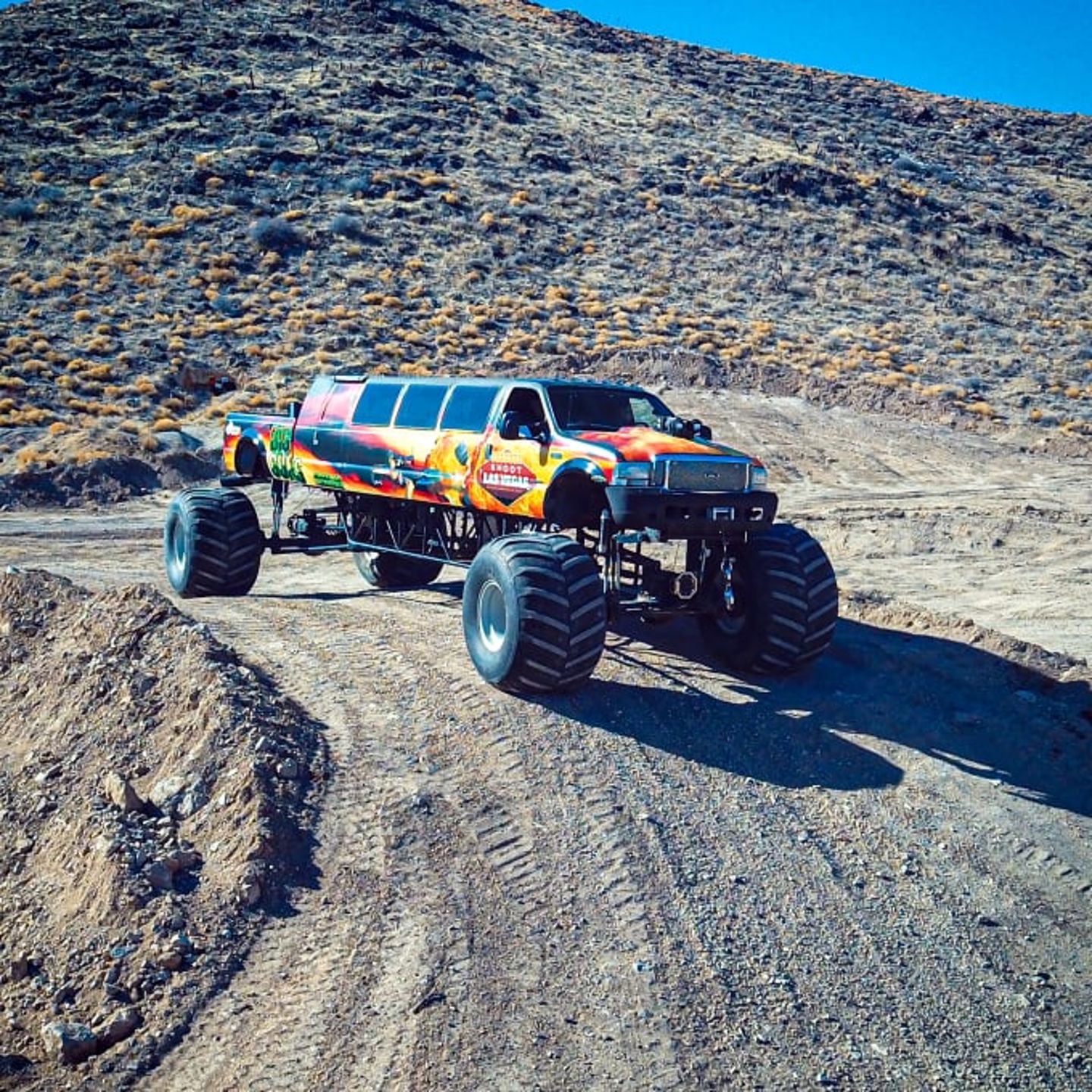 Monster truck on dirt road
