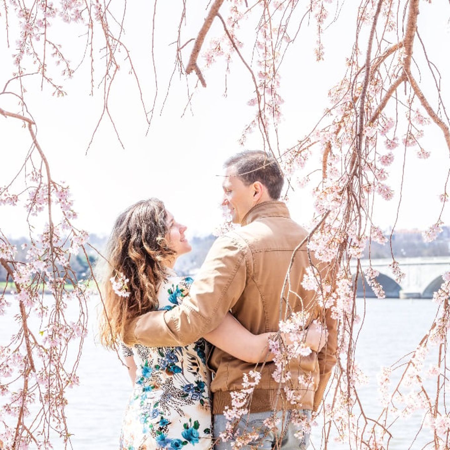 Couple at National Mall with cherry blossoms