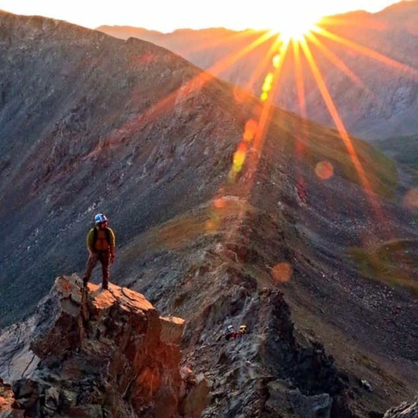 Person on top of mountain