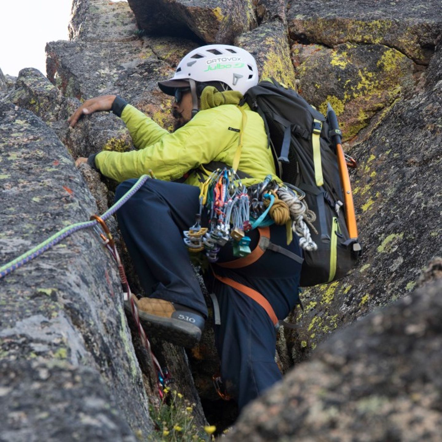 Person up close climbing rock