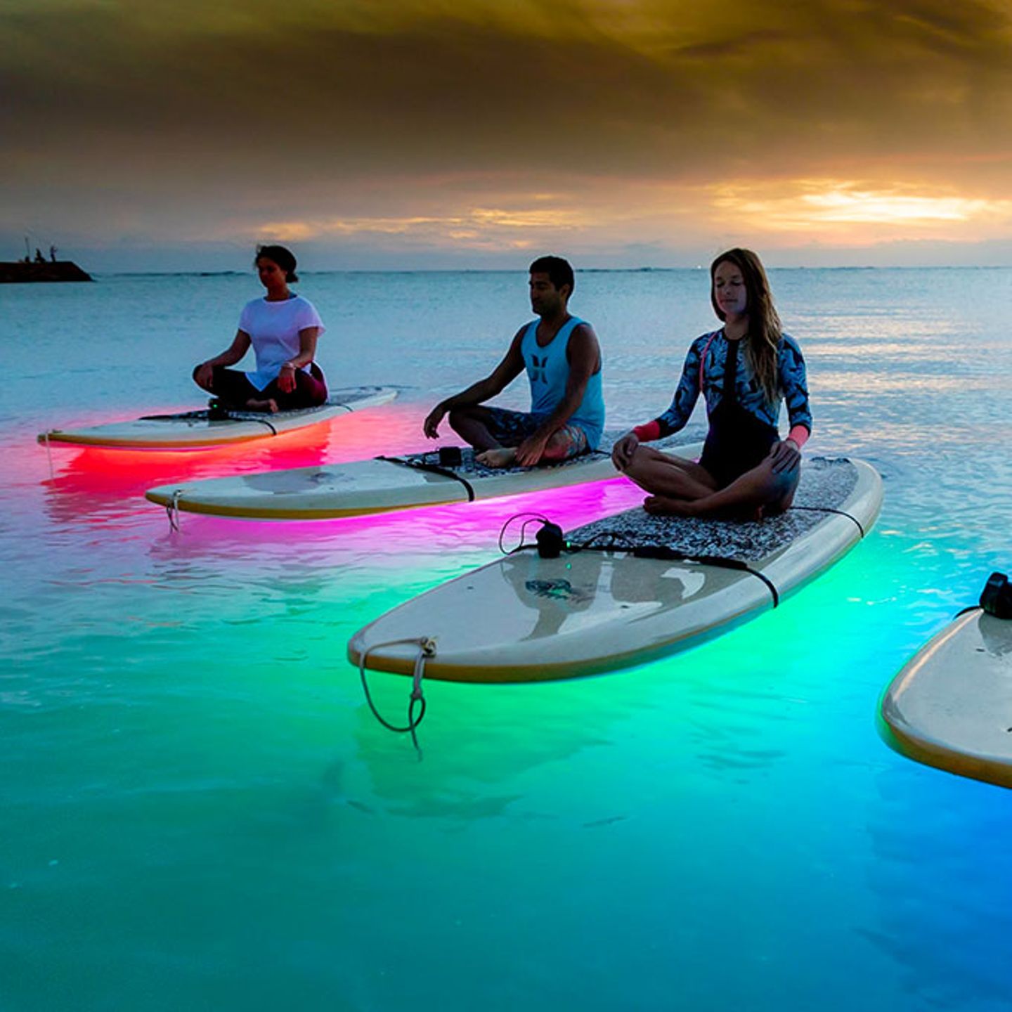 Nighttime Paddleboard Yoga
