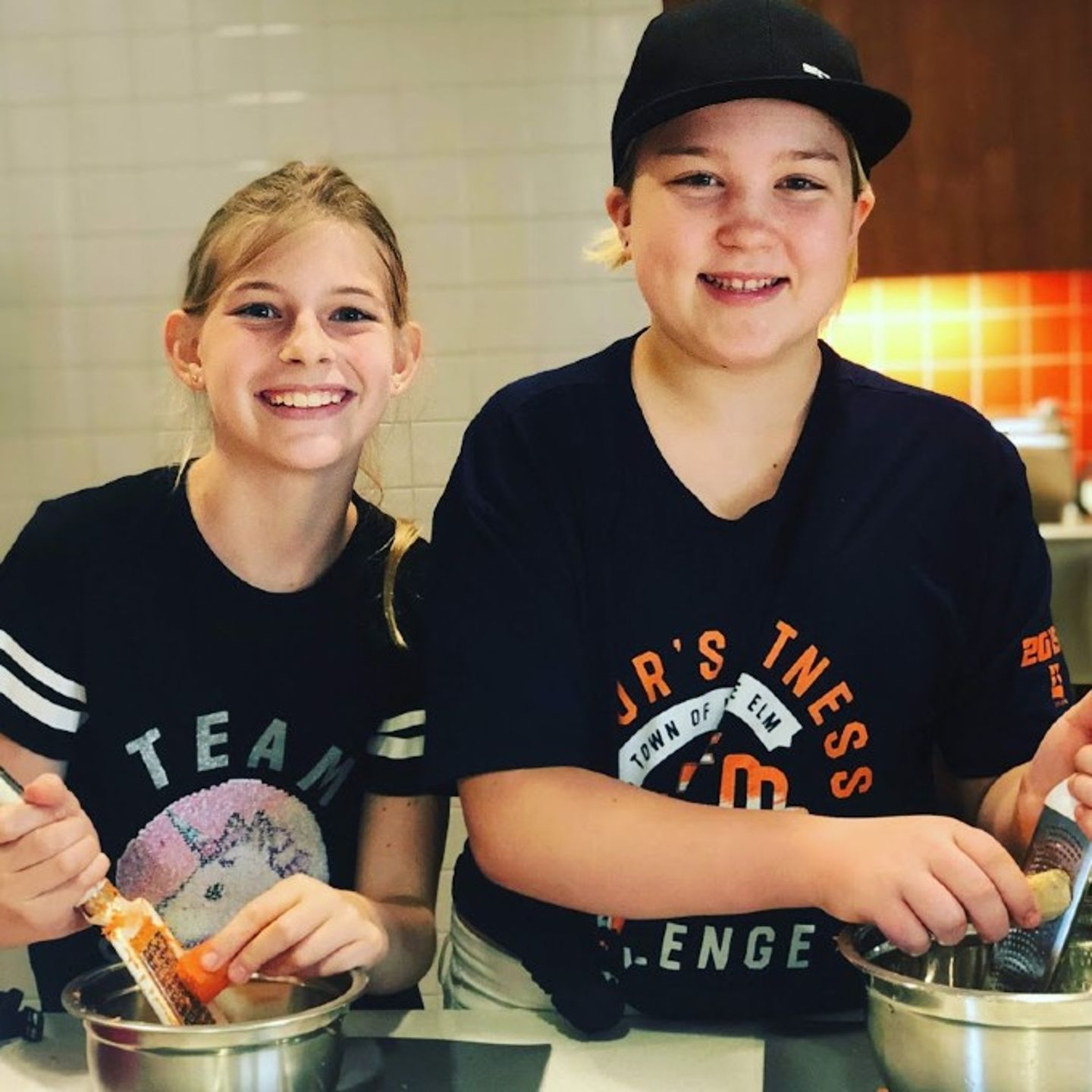 Two kids cooking