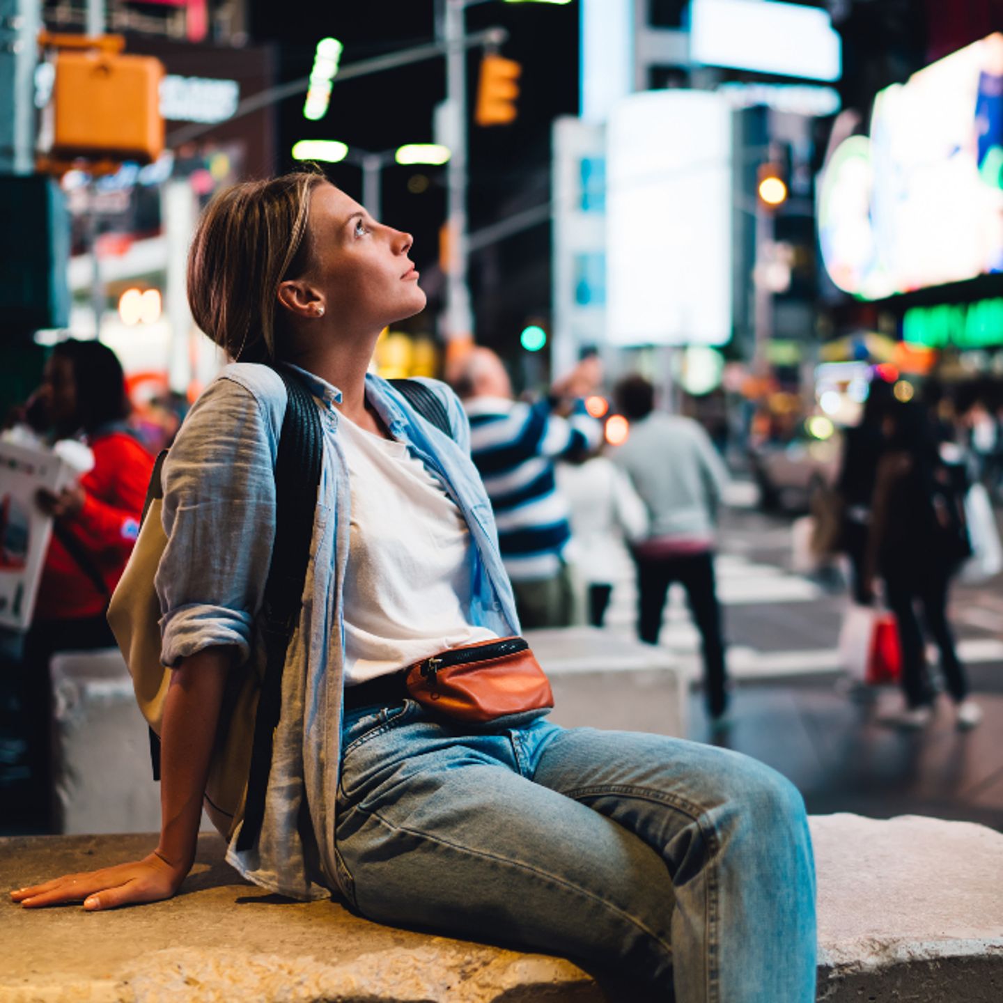 Woman sitting and posing