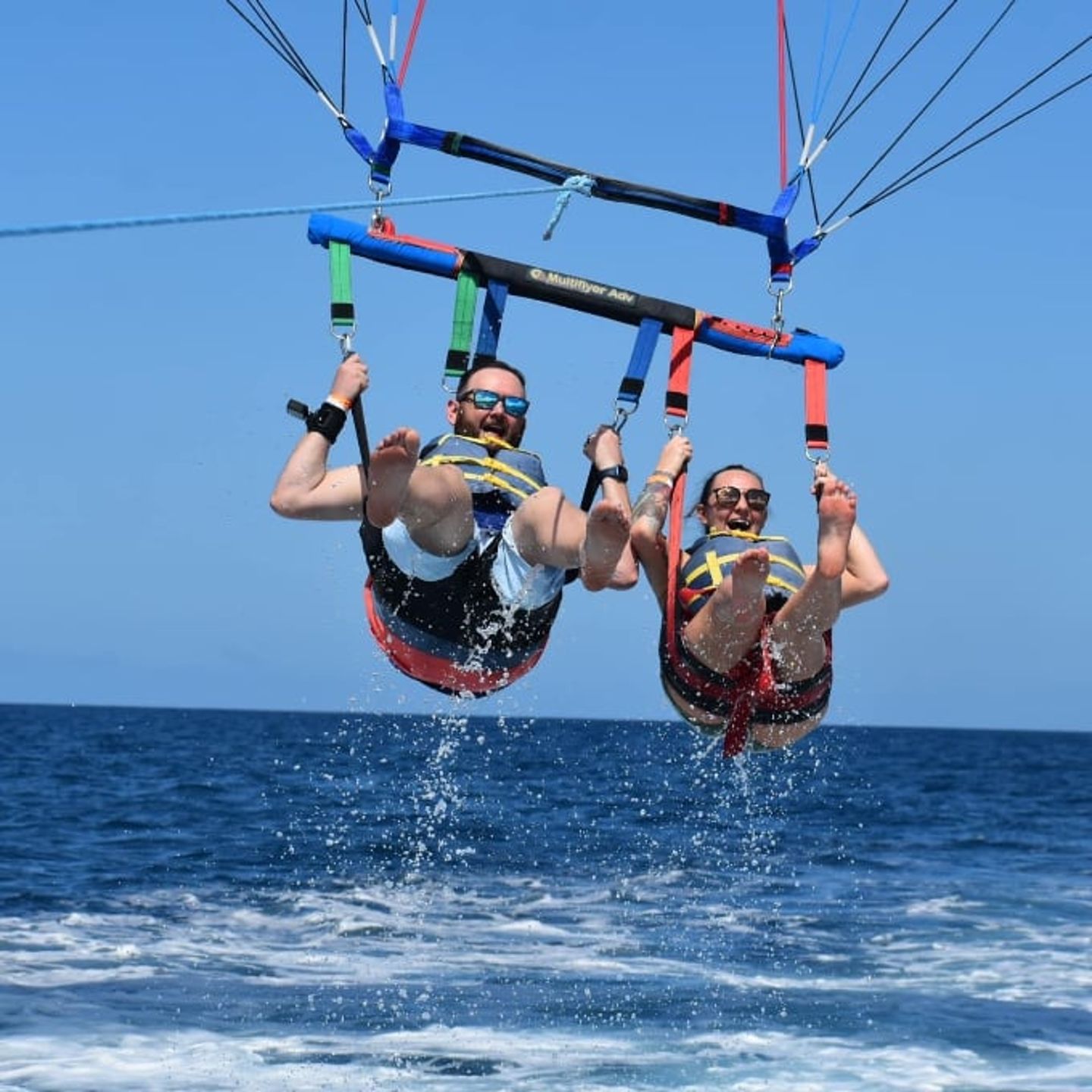 Two people above water