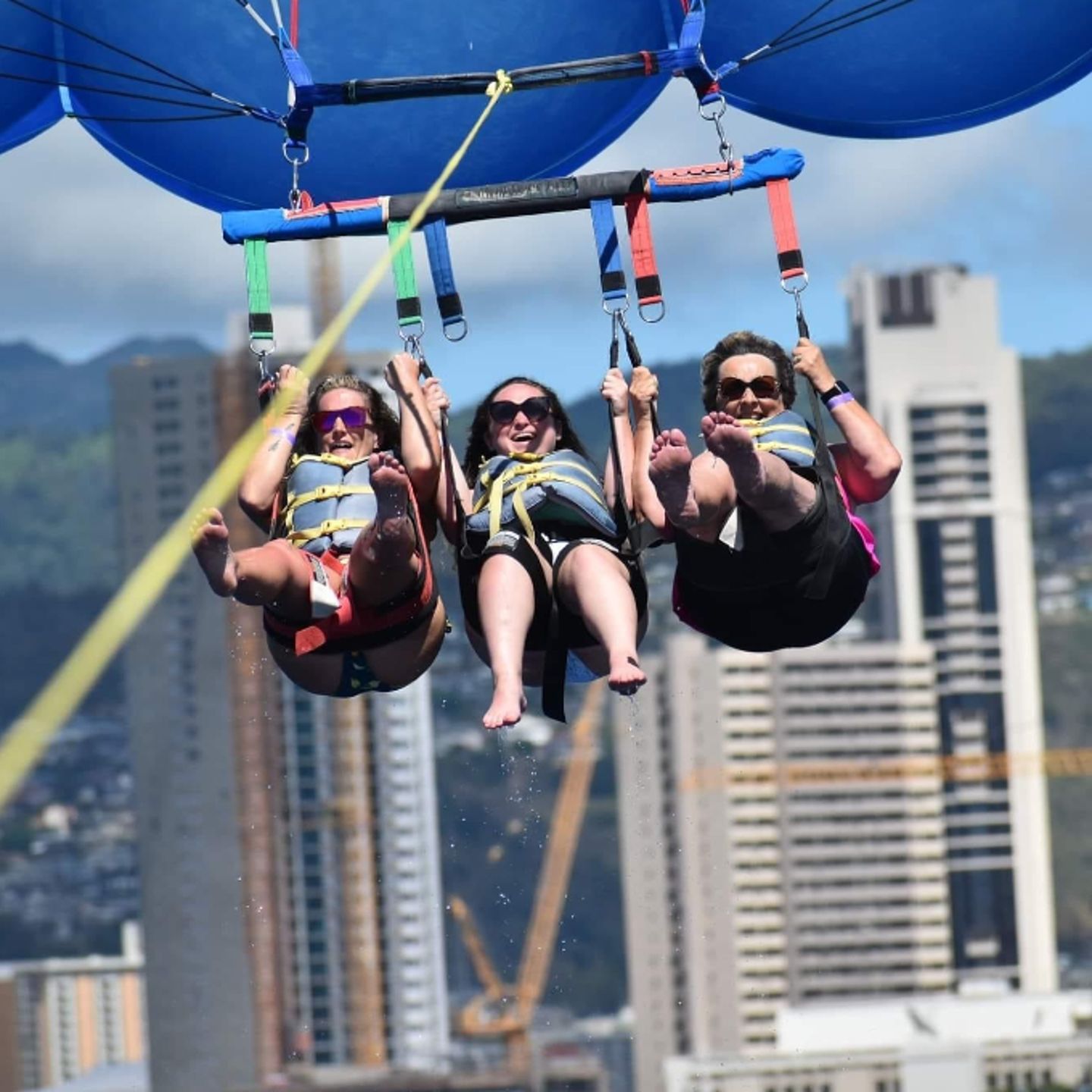 3 people on parasail