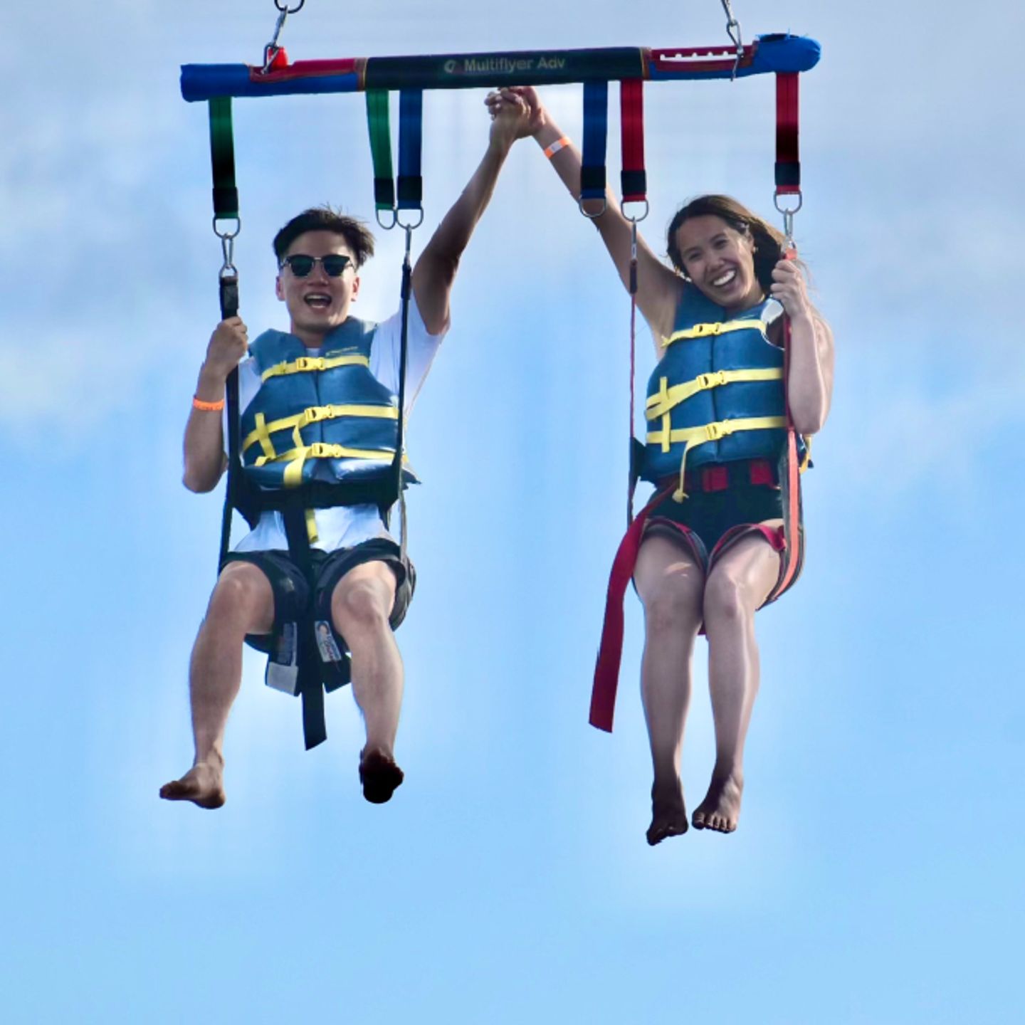 Two people holding hands