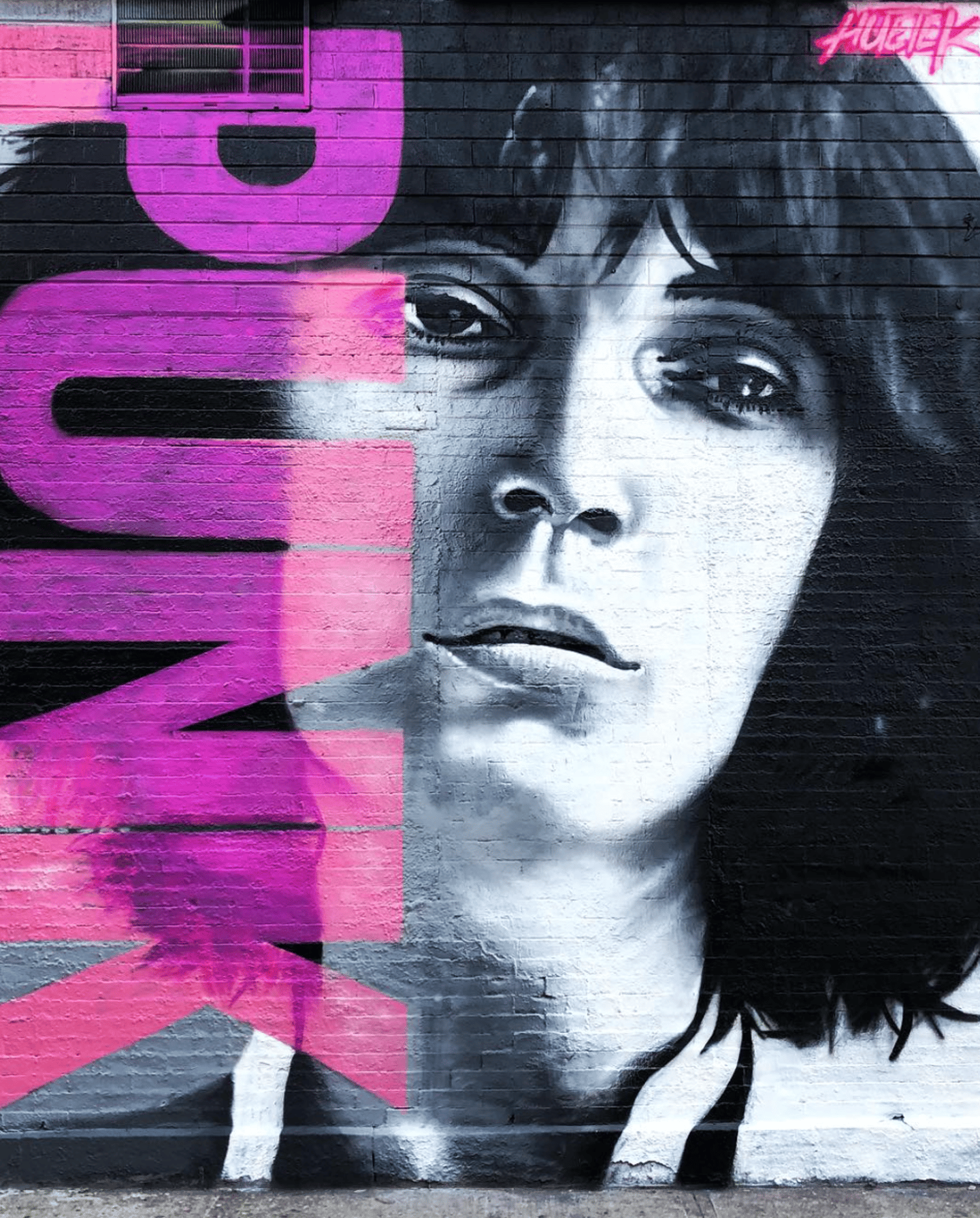 Rock artist on wall