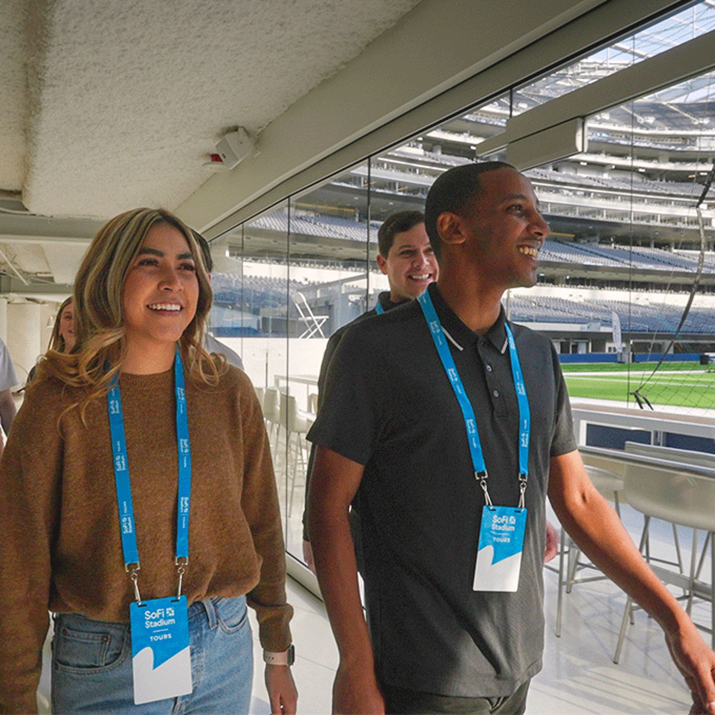 https://cdn.virgingifts.com/media/image/p/e/people-on-stadium-tour.gif