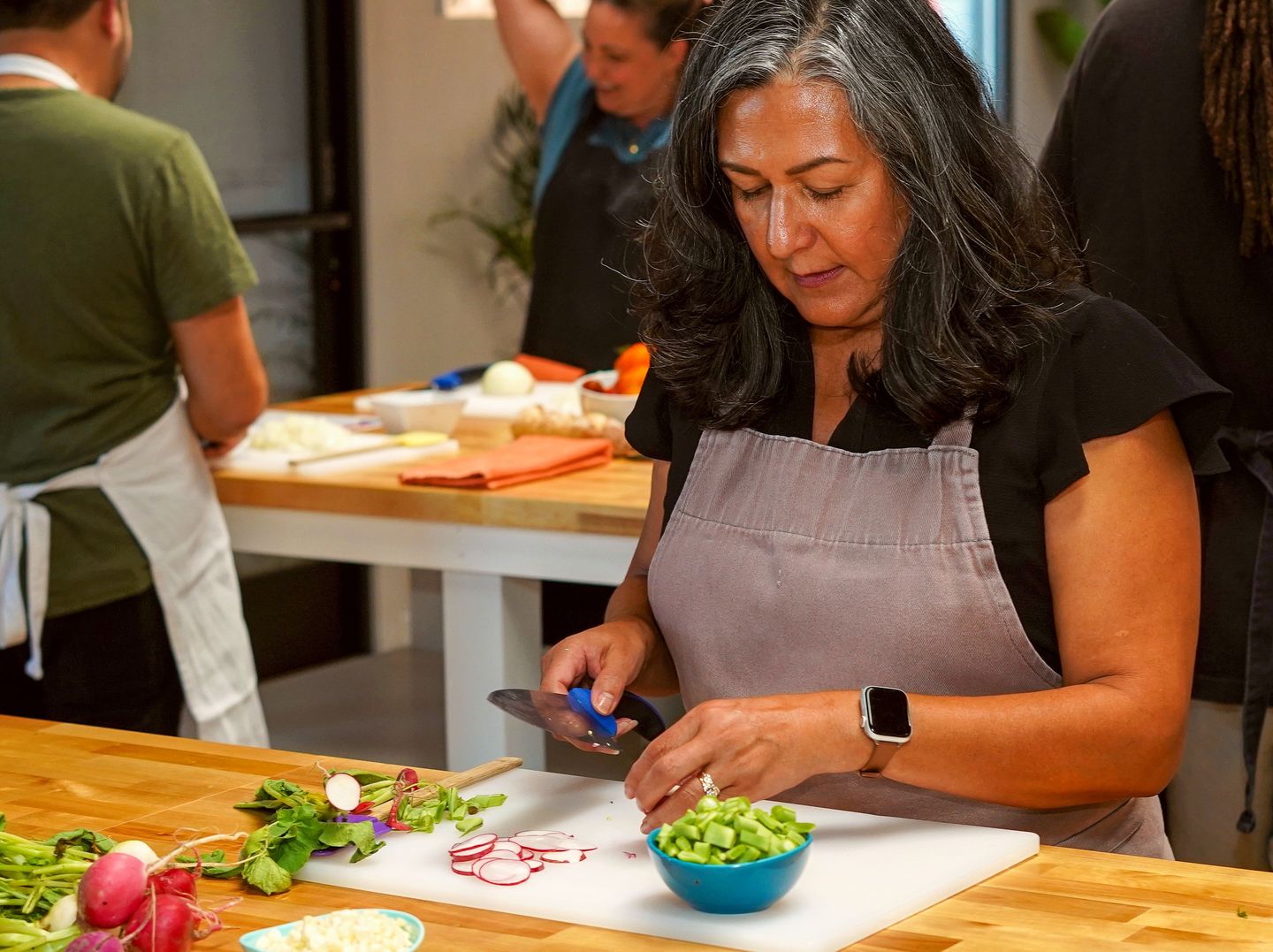 Woman cutting veggies