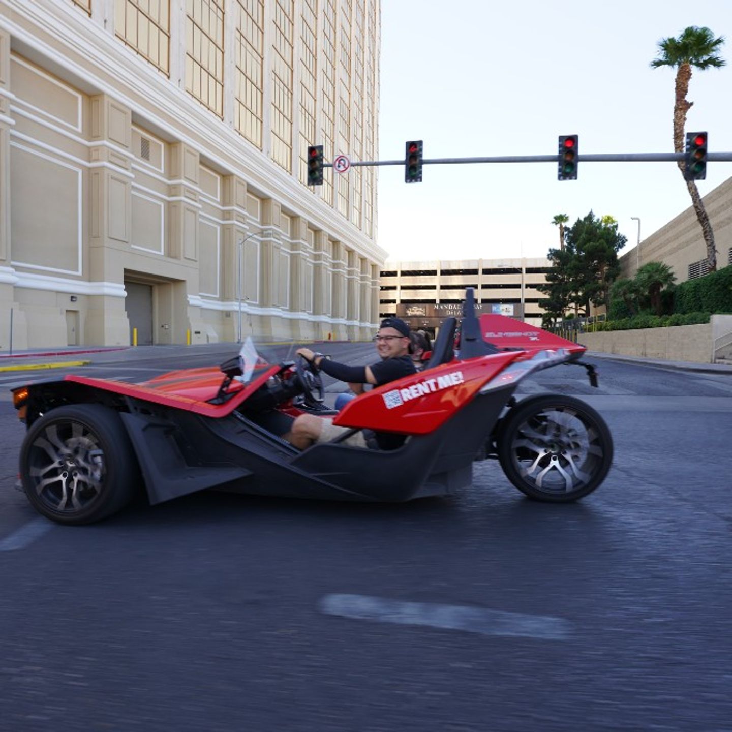 Person driving slingshot