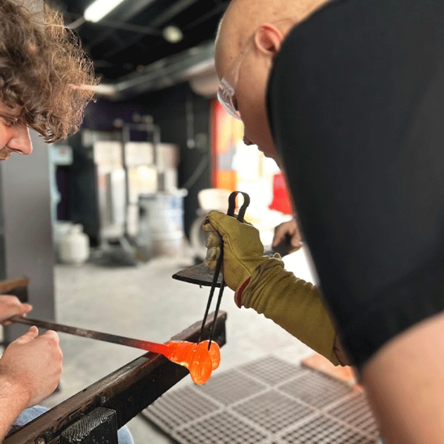 Instructor shaping glass