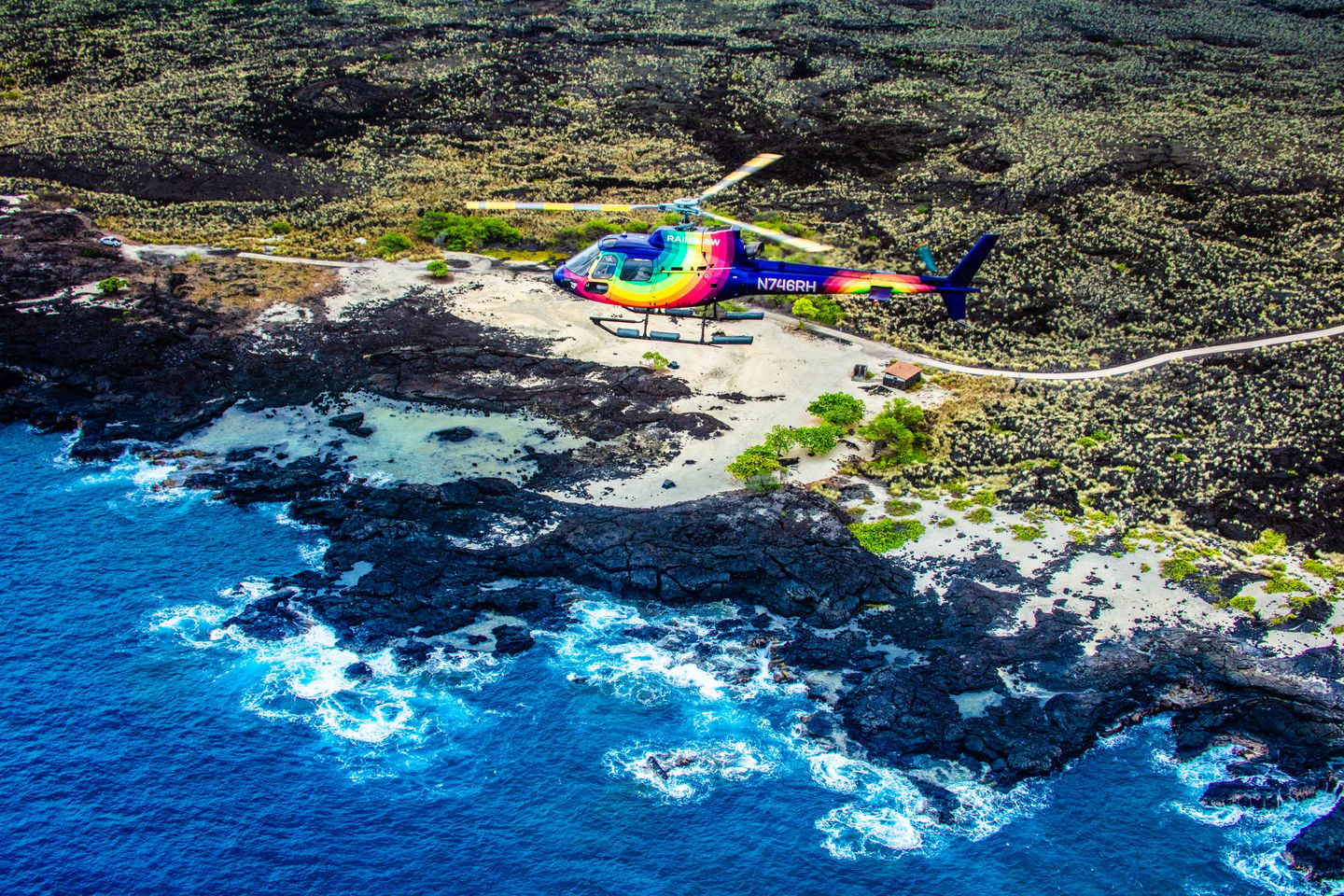 Helicopter flying along coast