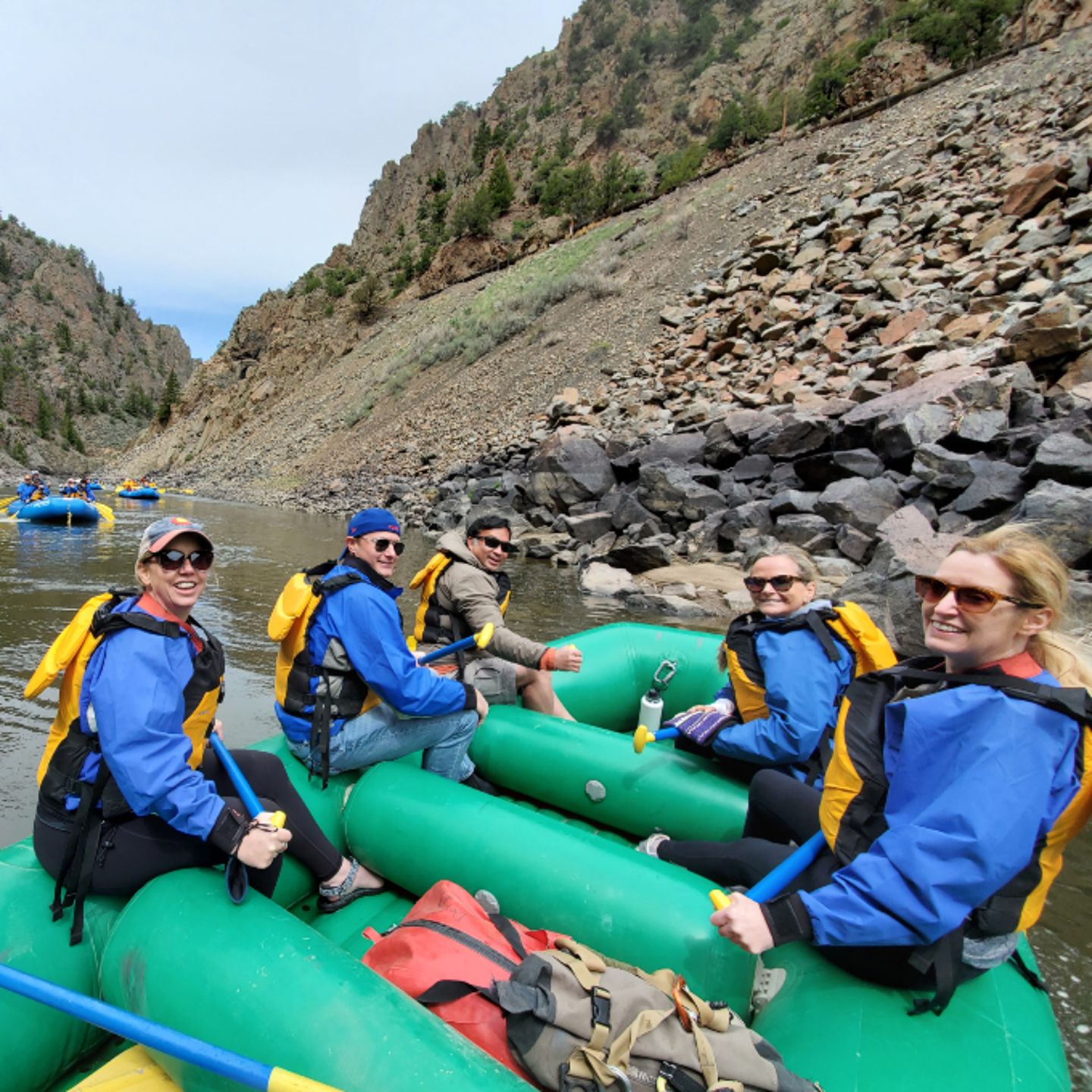 Group sitting on raft
