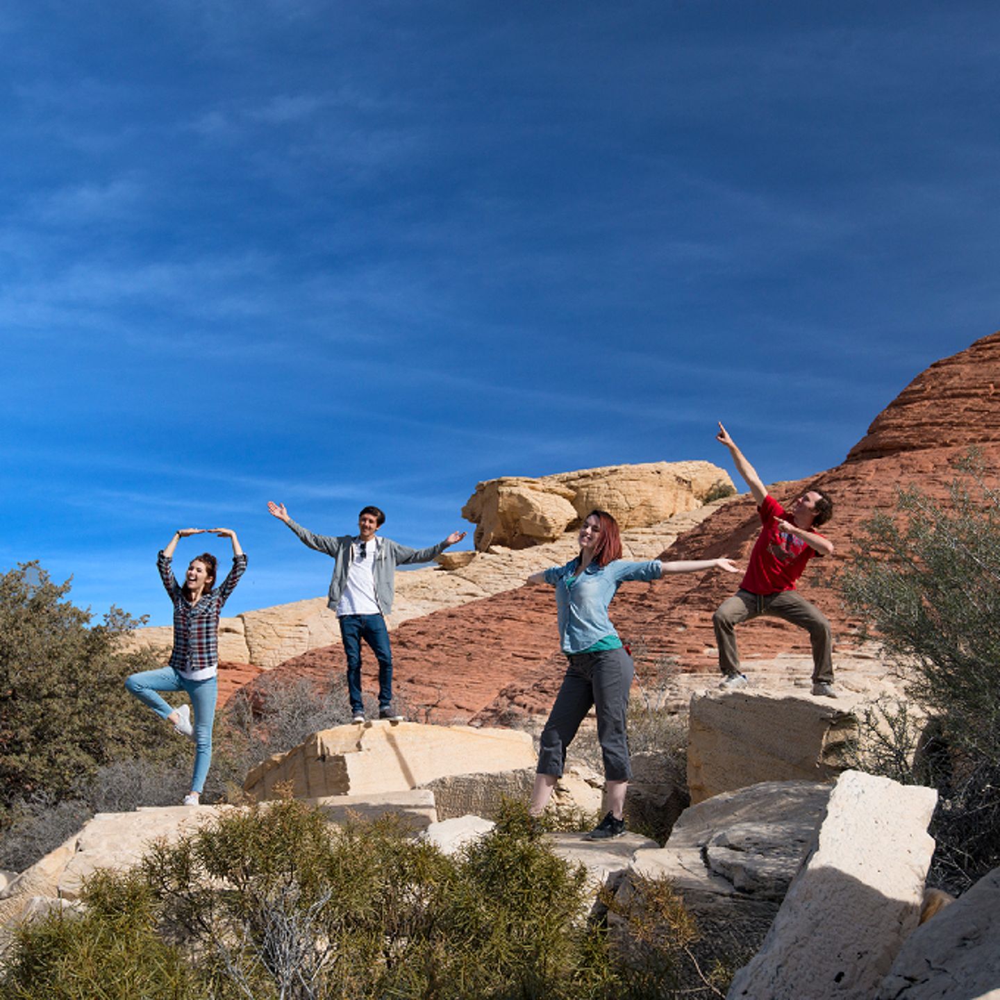 Group poses on rocks