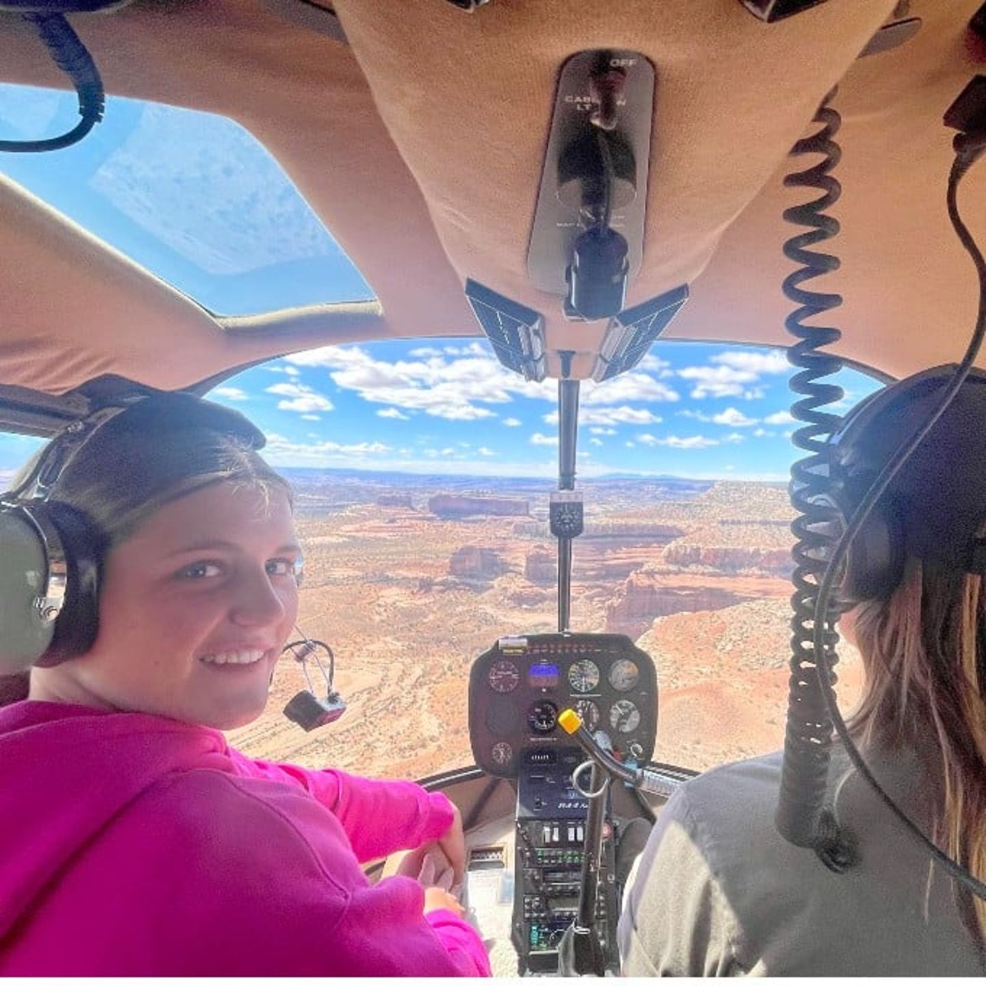 People in Plane with Canyon View