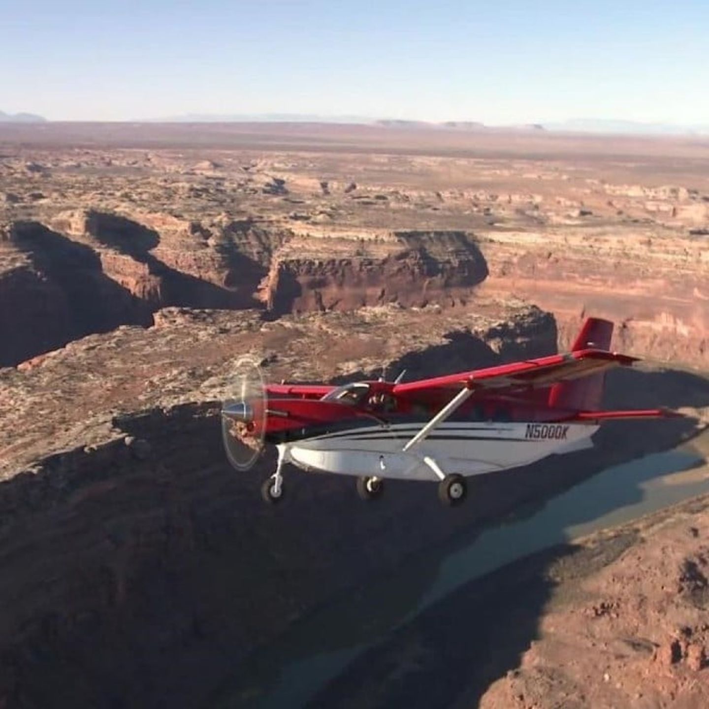 Red Plane Over Canyon