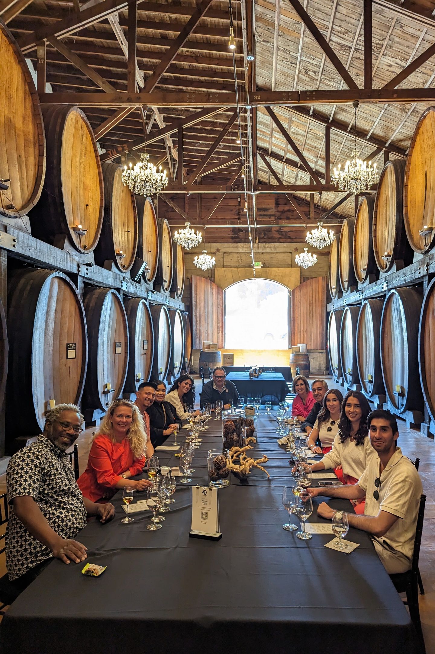 Group at table in winery