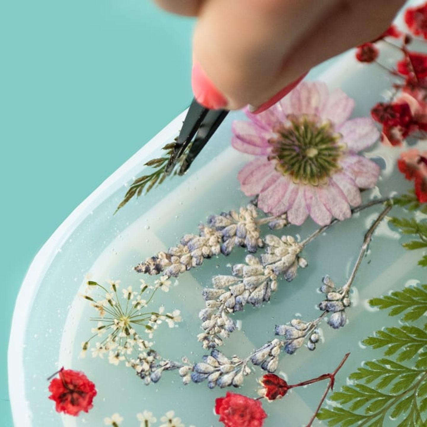 Placing floral on tray