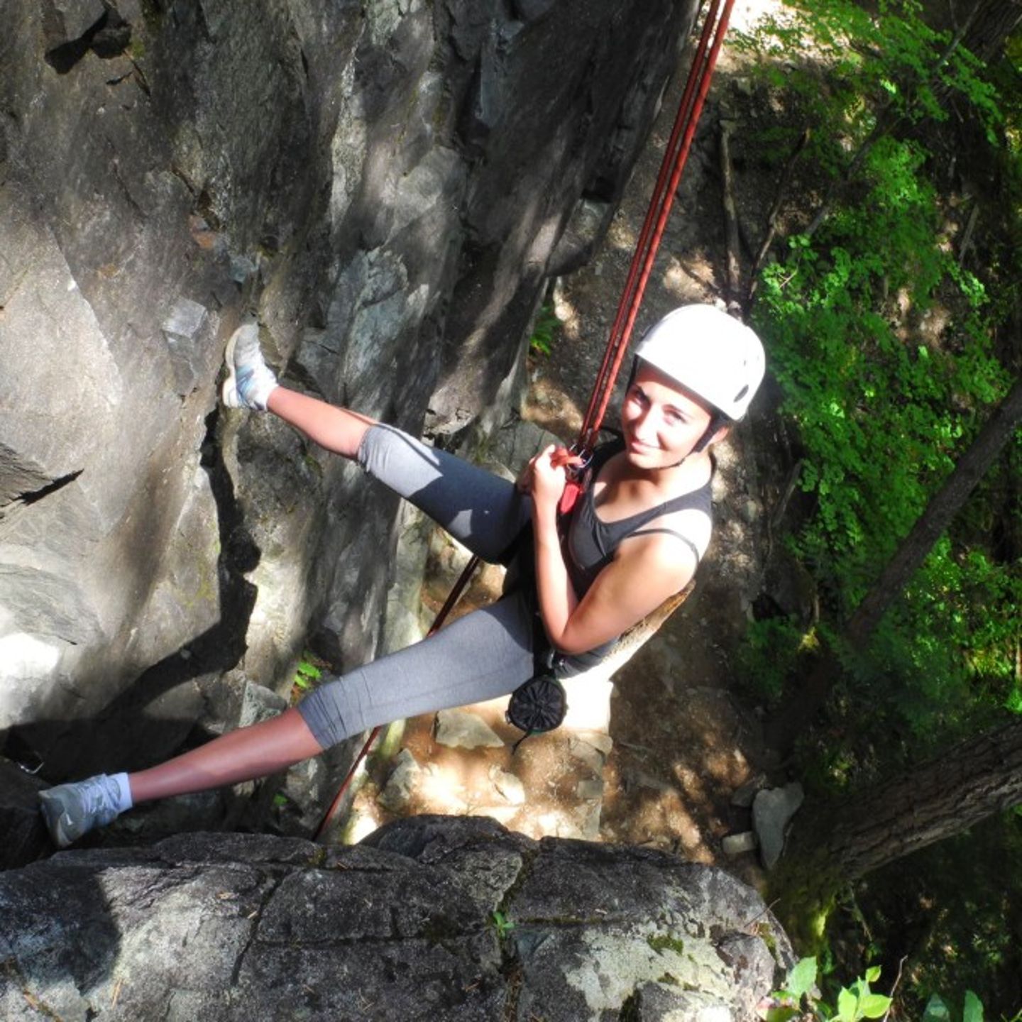 Woman rock climbing