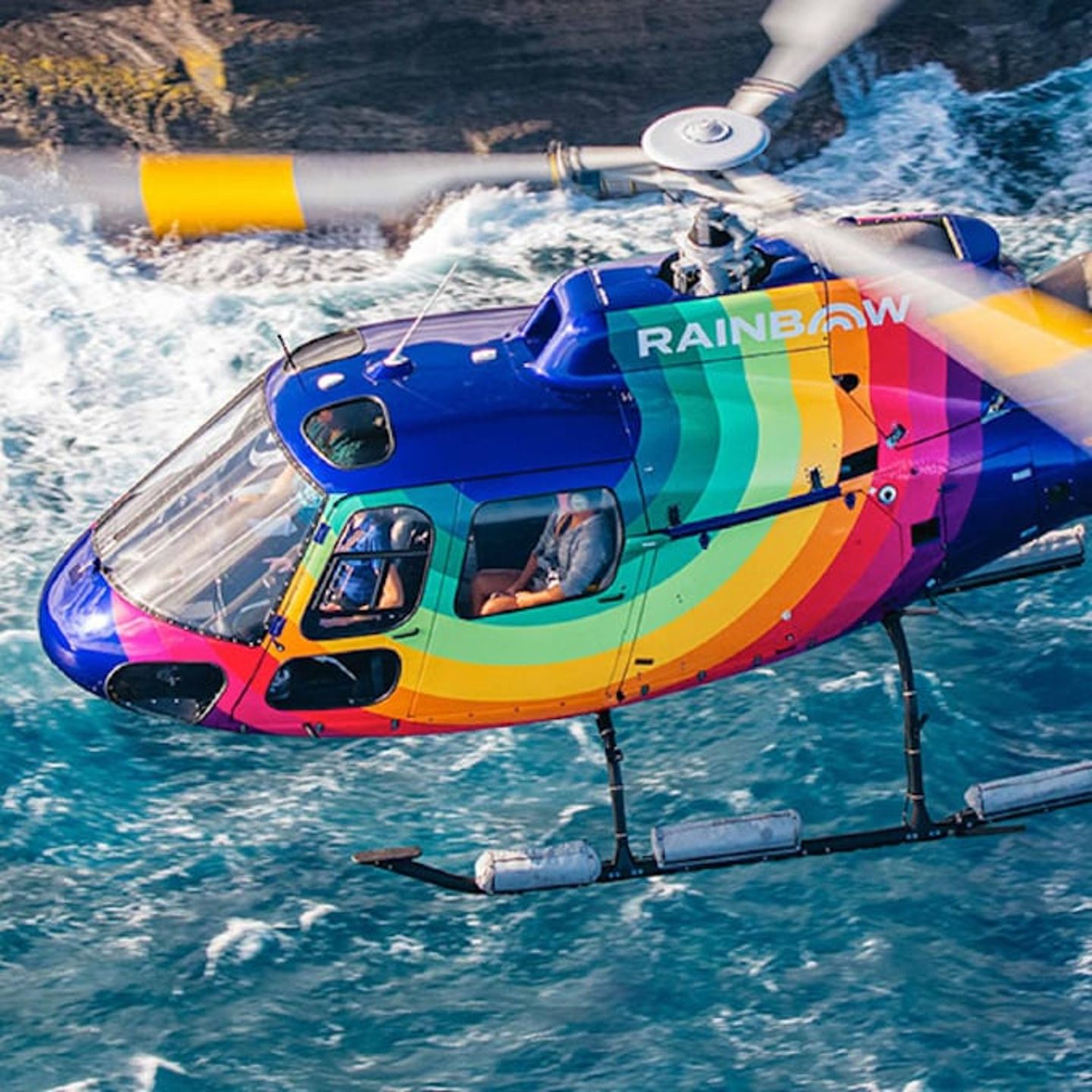 Helicopter flying over water