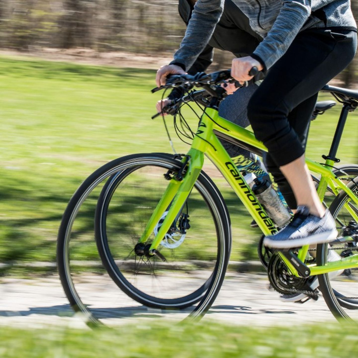 Two People Riding in Park