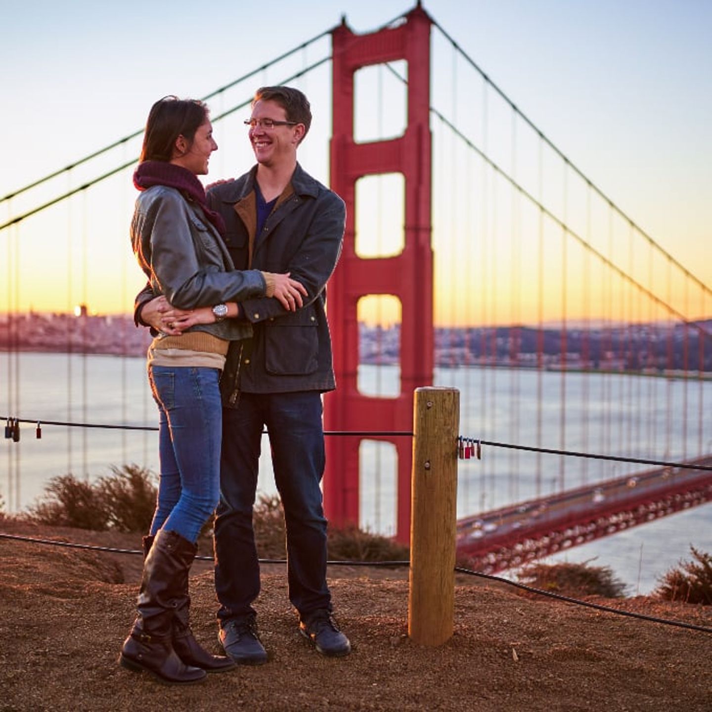 Couple standing near bridge