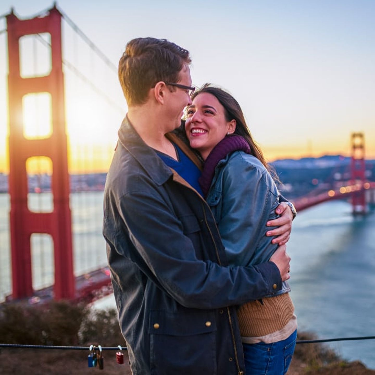 Couple hugging near bridge