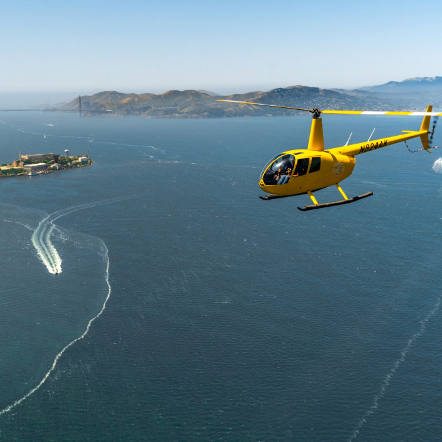 Helicopter flying over water
