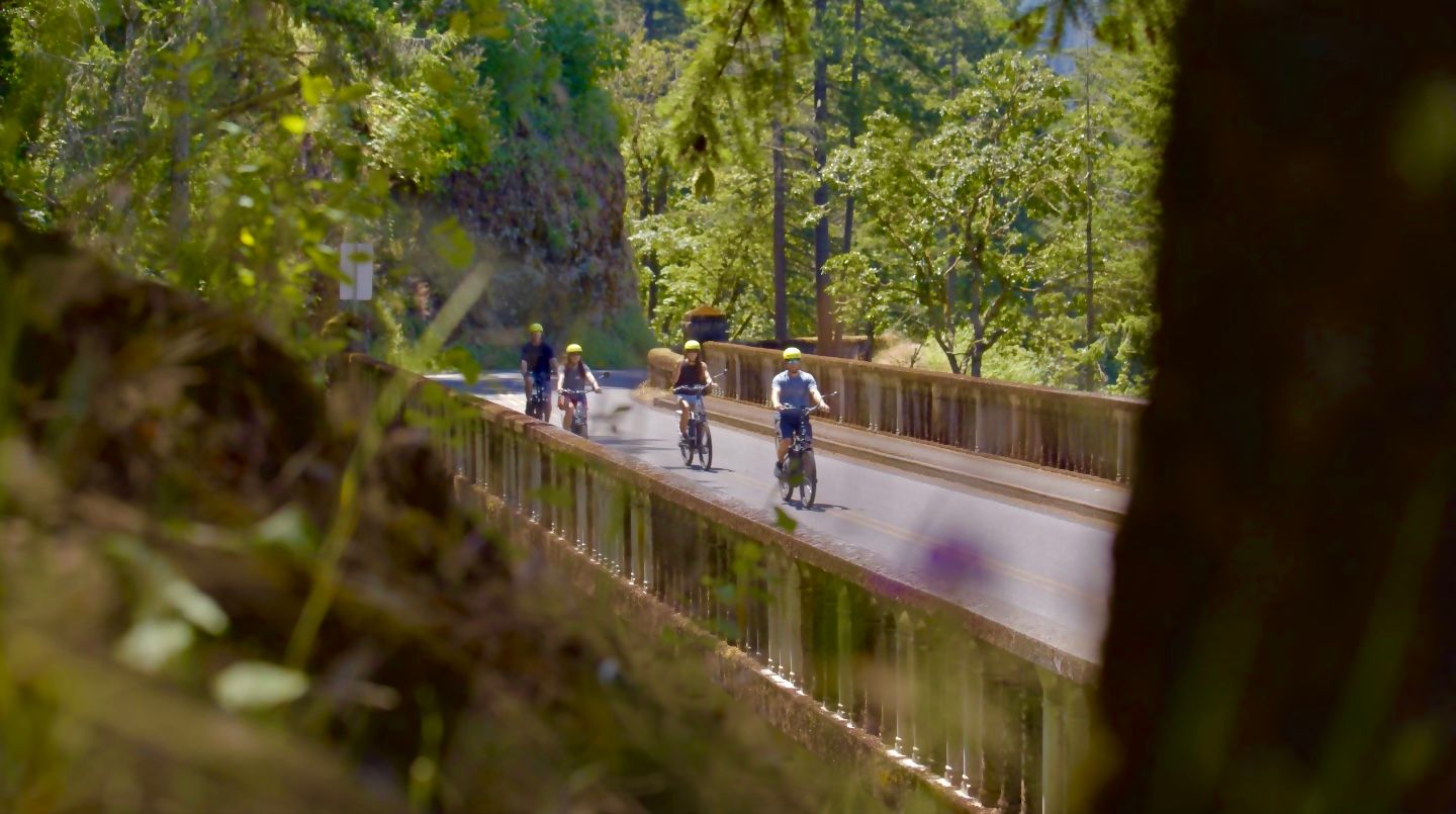 Group riding on bridge