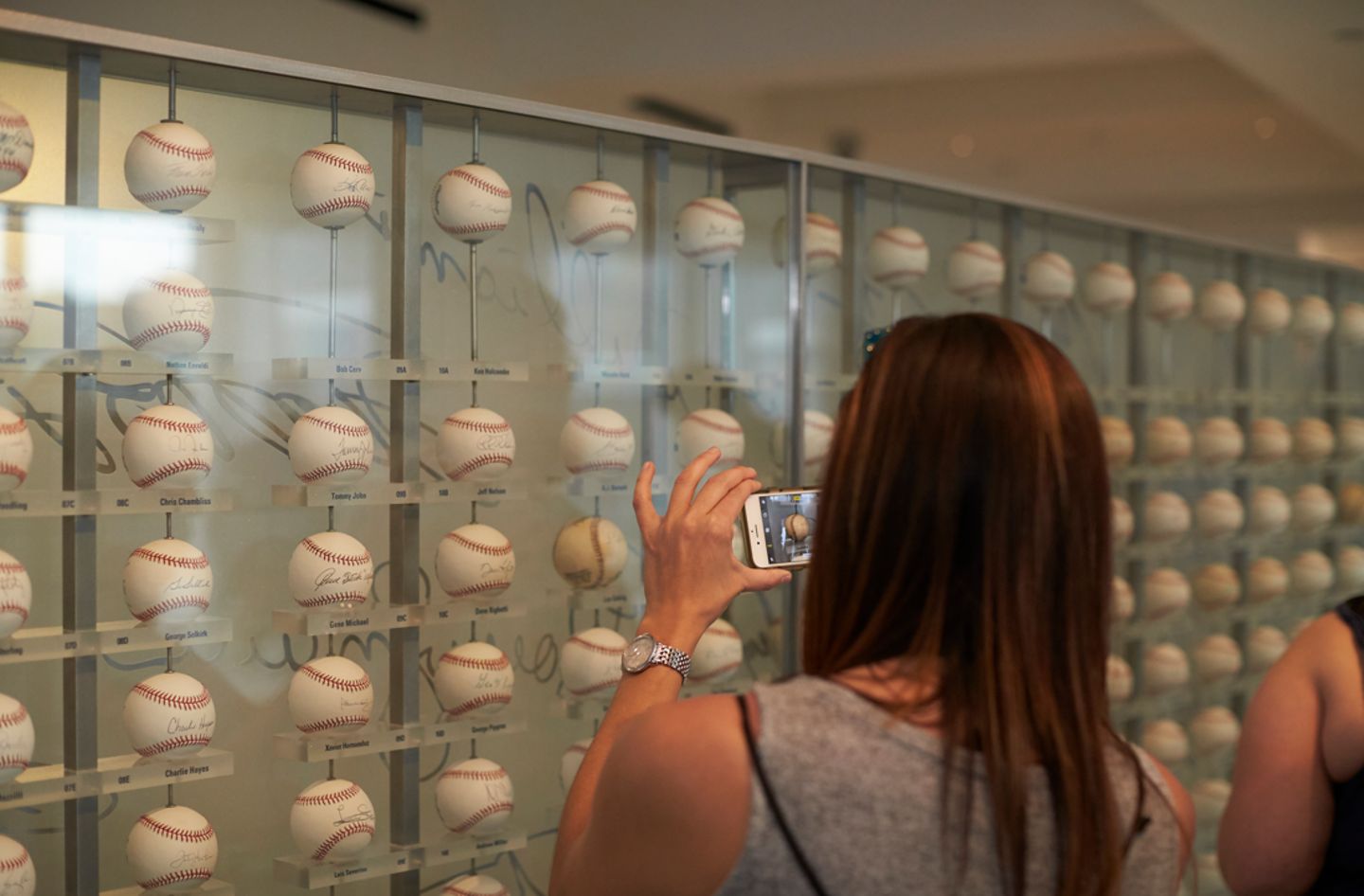 Woman looking at balls 