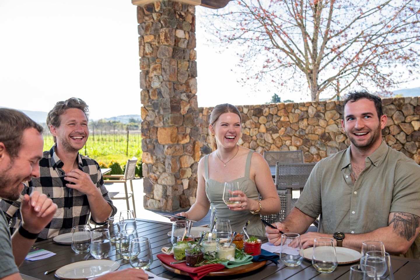 Group enjoying wine and bites