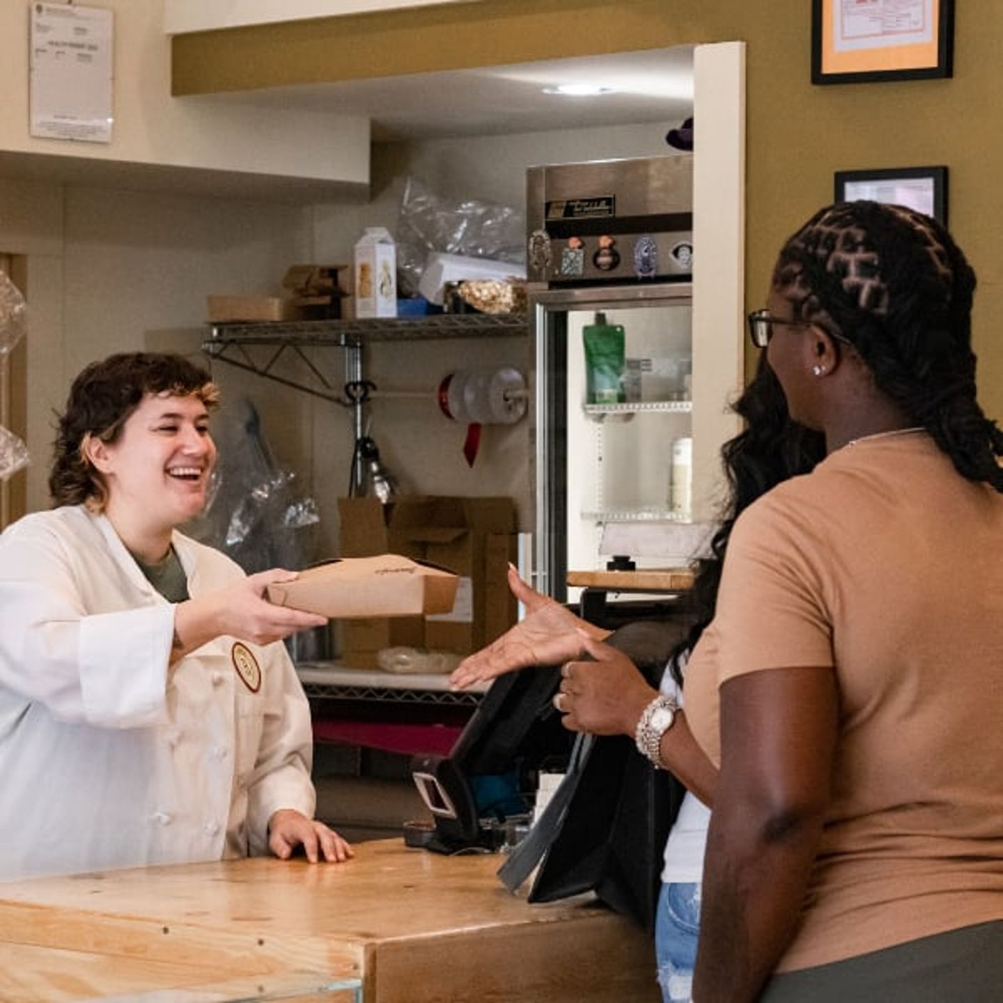 Woman handing over food