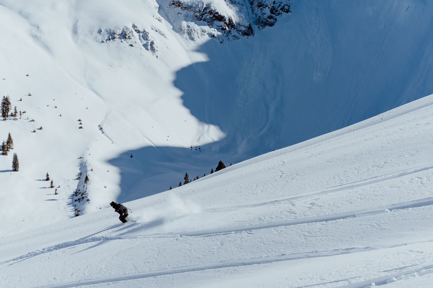 Person skiing down mountain