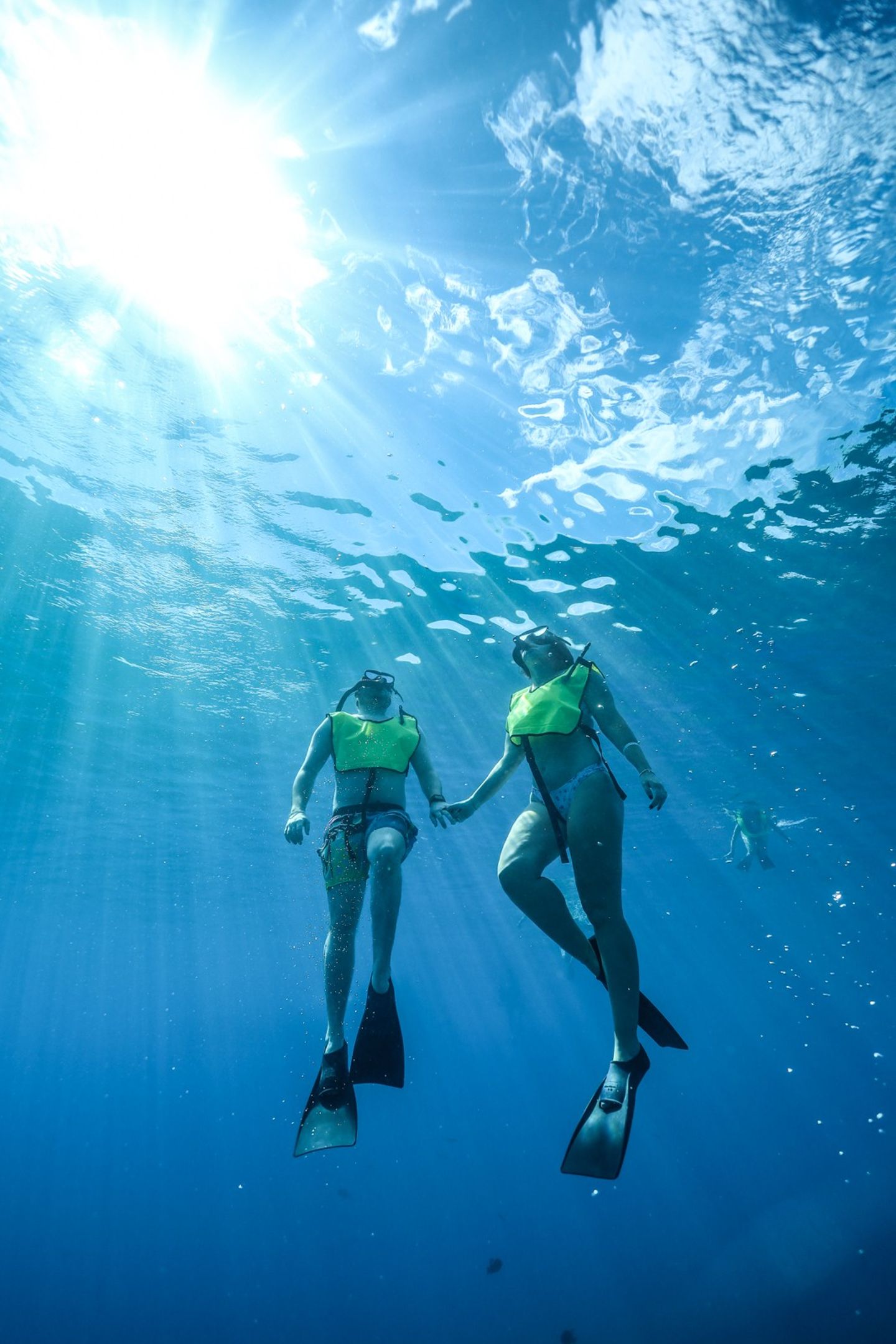 Two people swimming