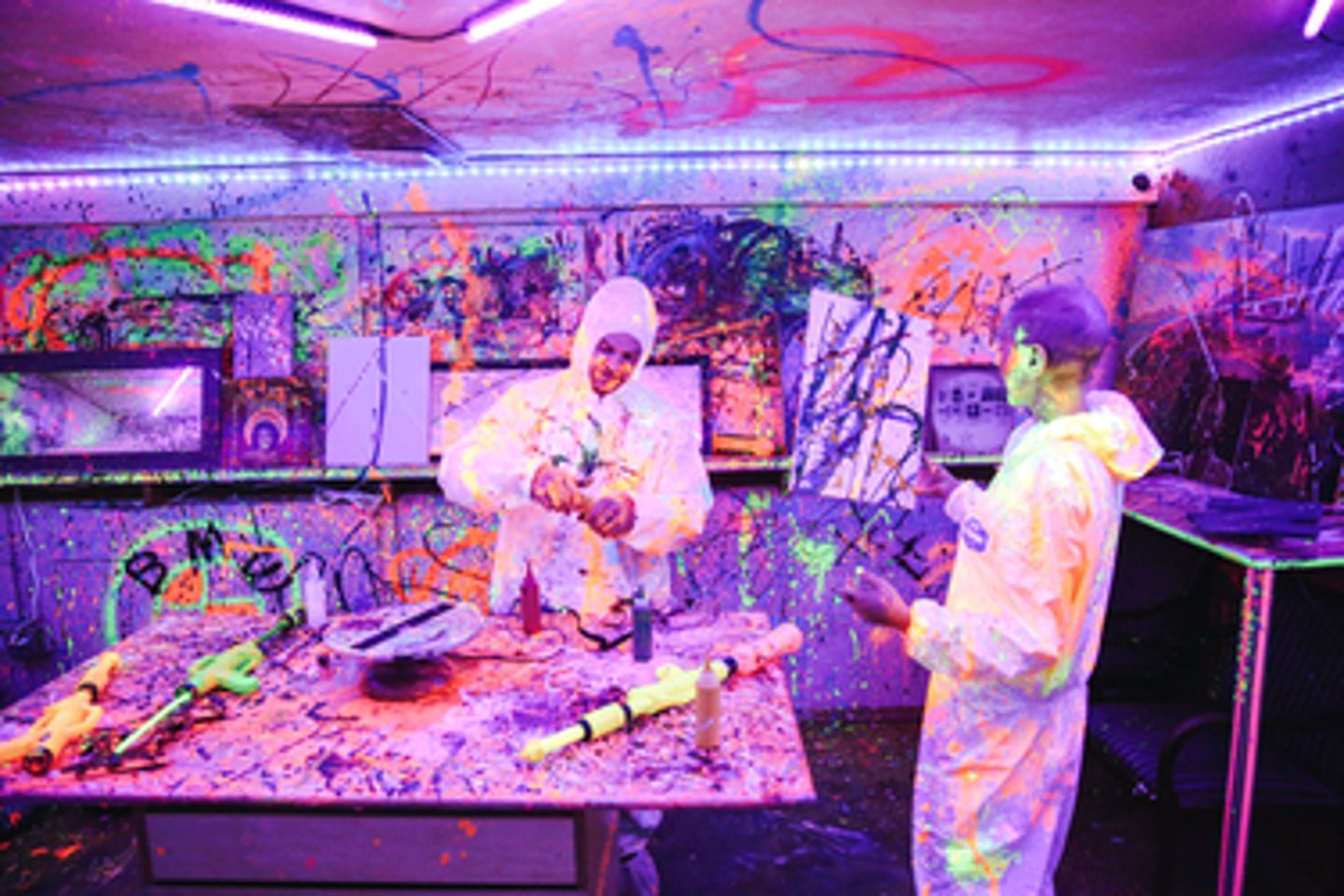 Two people in splatter room