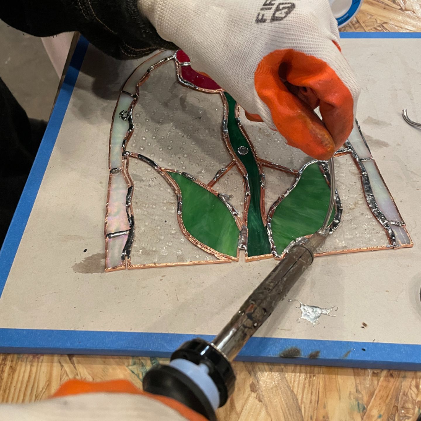 Person working on glass