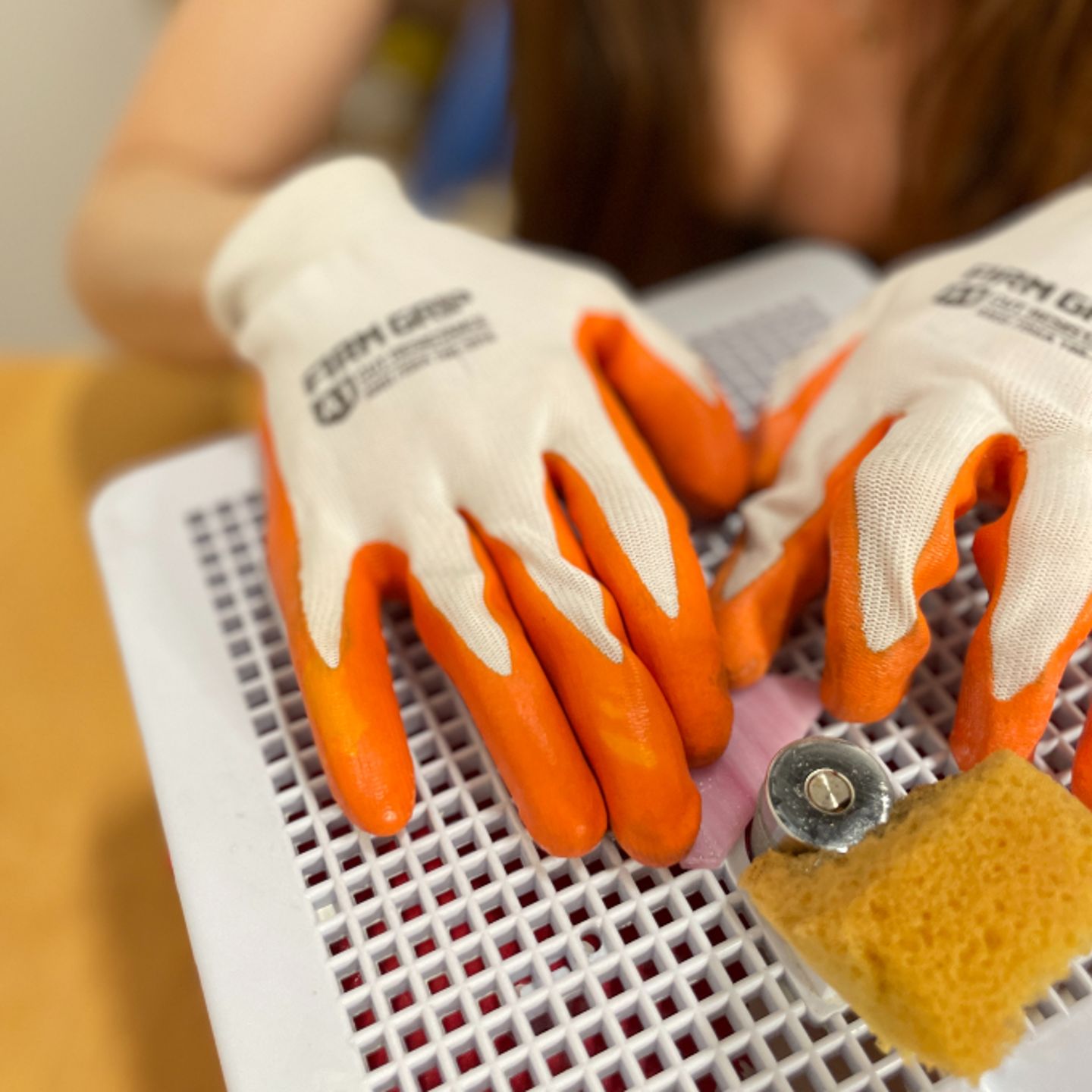 Person cutting glass